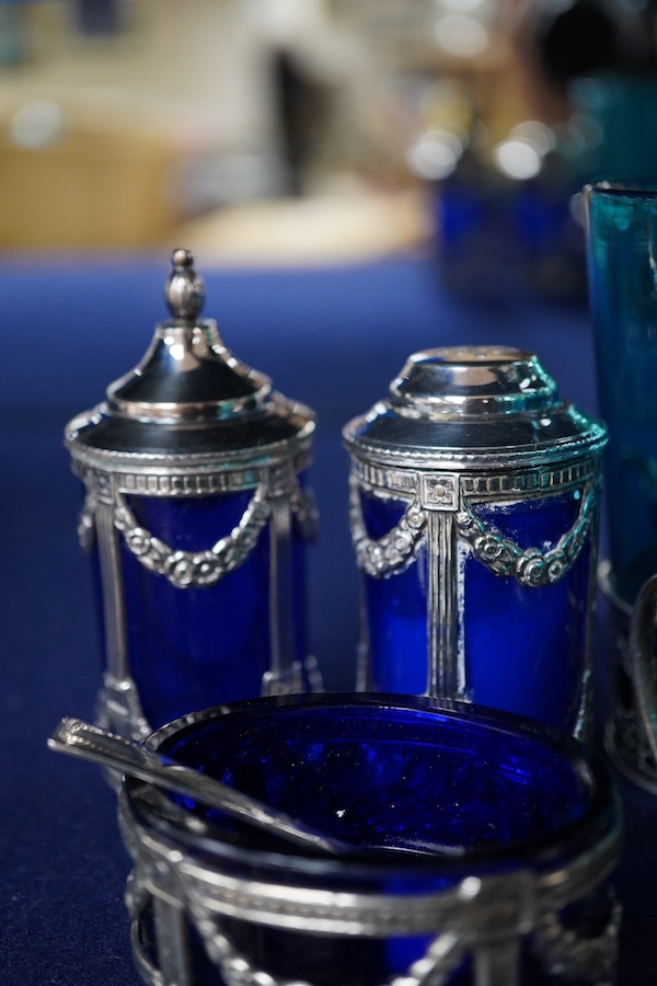 Four coloured glasses with silver stands a similar glass swan salt, a three piece cruet with white metal mounts and a plated single stem epergne, glasses and stands 9cm high., Condition - good